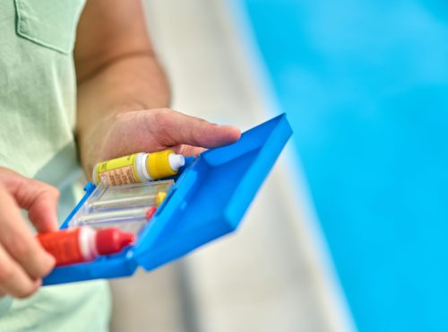 Water test. Close up picture of mans hands with water tests